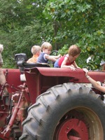 kids flying a tractor