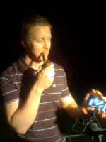 Fennell, with iPhone and pipe, at the party