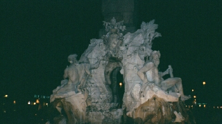 The central fountain of the Piazza is by Bernini.  His figures are said to be recoiling in aesthetic horror from the church directly opposite, which was designed by one of Bernini's rivals.